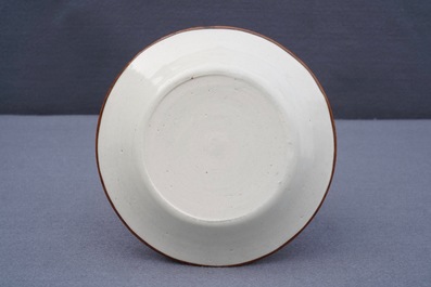 A Chinese dingyao carved 'ducks' plate, probably Song